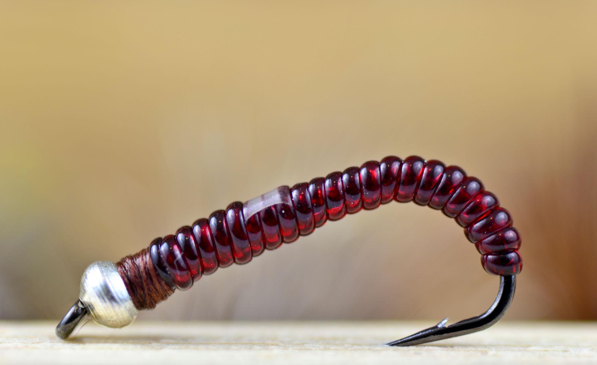 Artificial worm fly